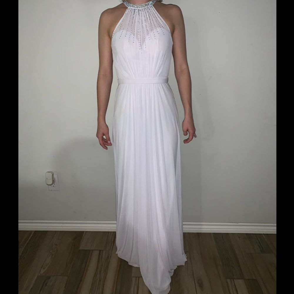 White floor length gown.